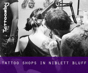Tattoo Shops in Niblett Bluff